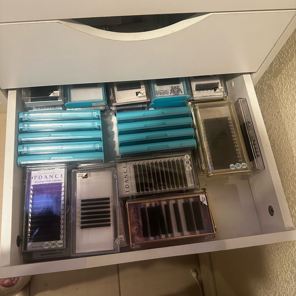 Over 50 trays of lashes used and new all different sizes and curls